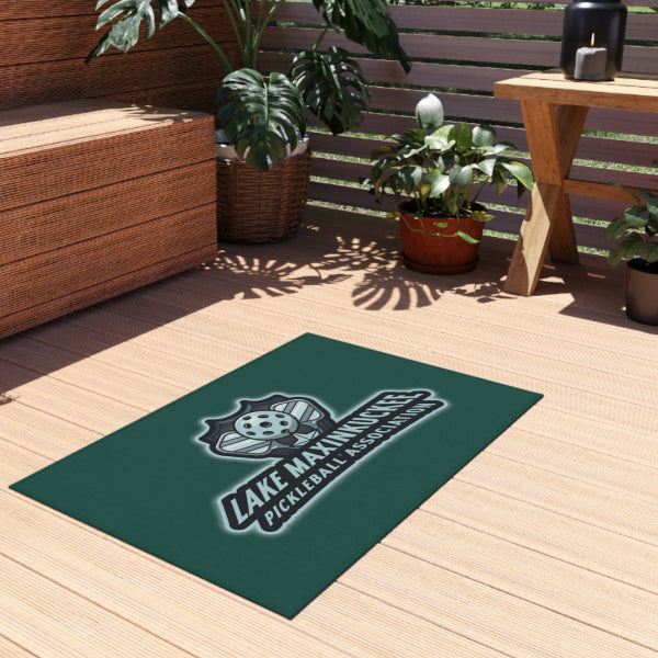 graphic of two pickleball paddles crossed with text Lake Maxinkuckee Pickleball Association