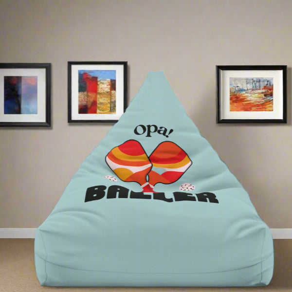 graphic of two pickleball paddles crossed with text OPA! above and BALLER underneath