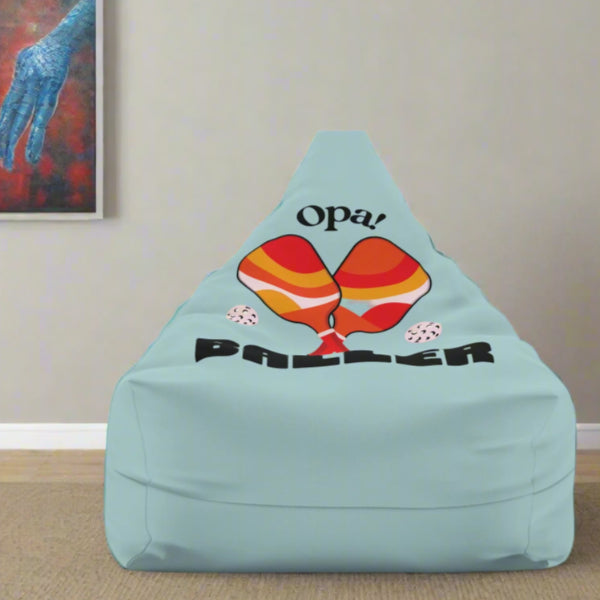 graphic of two pickleball paddles crossed with text OPA! above and BALLER underneath