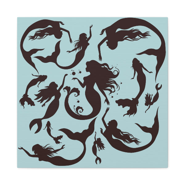 Square stretched canvas with sky blue background and printed with mermaid silhouettes.