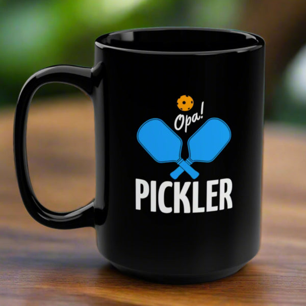 graphic of two pickleball paddles crossed with text OPA! above and PICKLER underneath