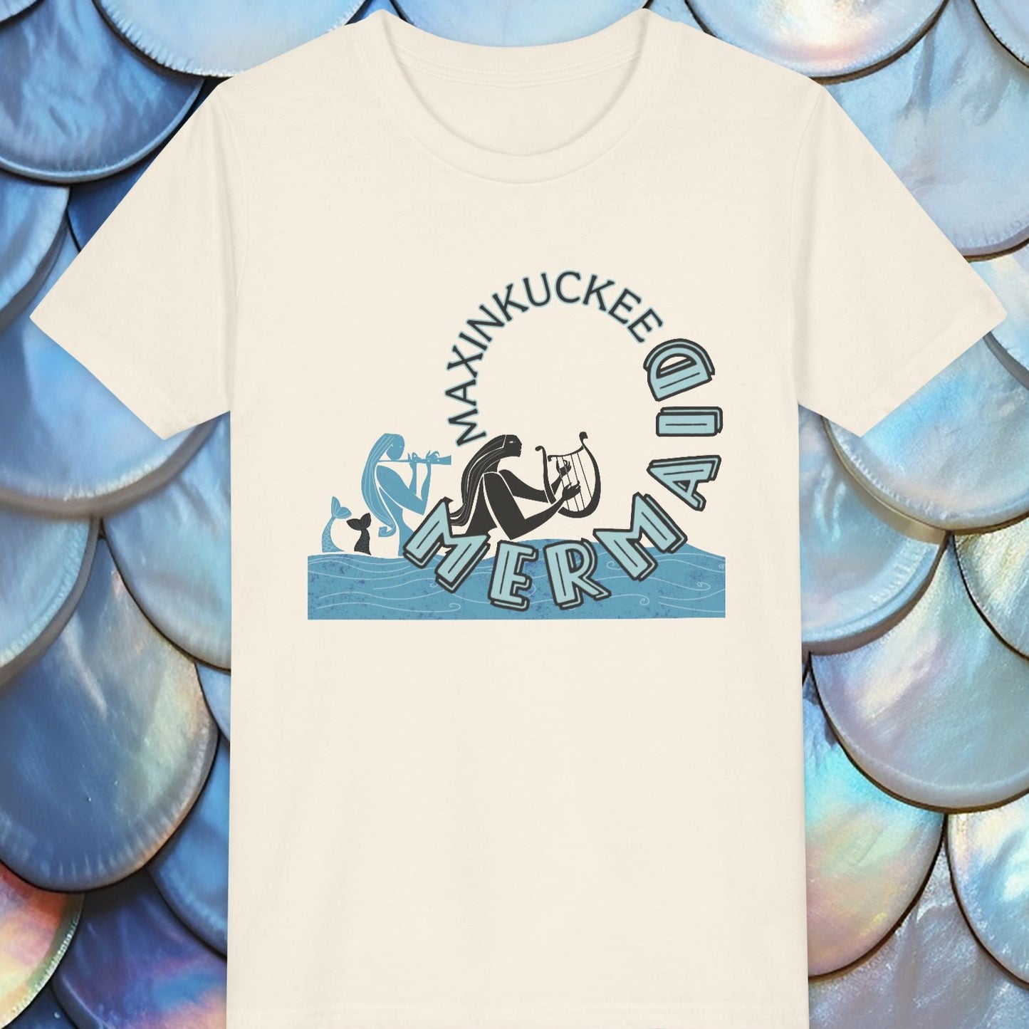 T-shirt with 'Maxinkuckee Mermaid' design on a background of blue and silver scales.