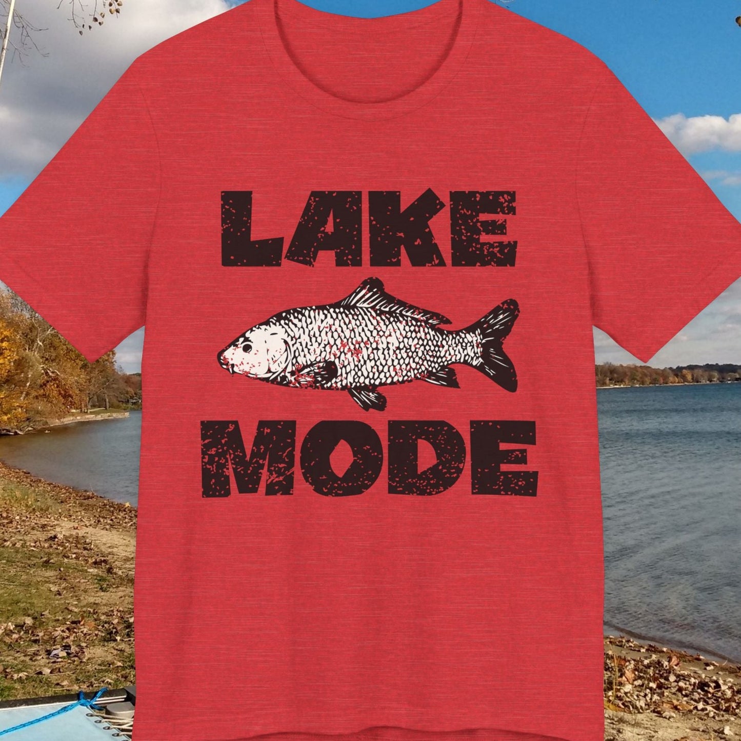 Red t-shirt with 'Lake Mode' graphic on a lakeside background