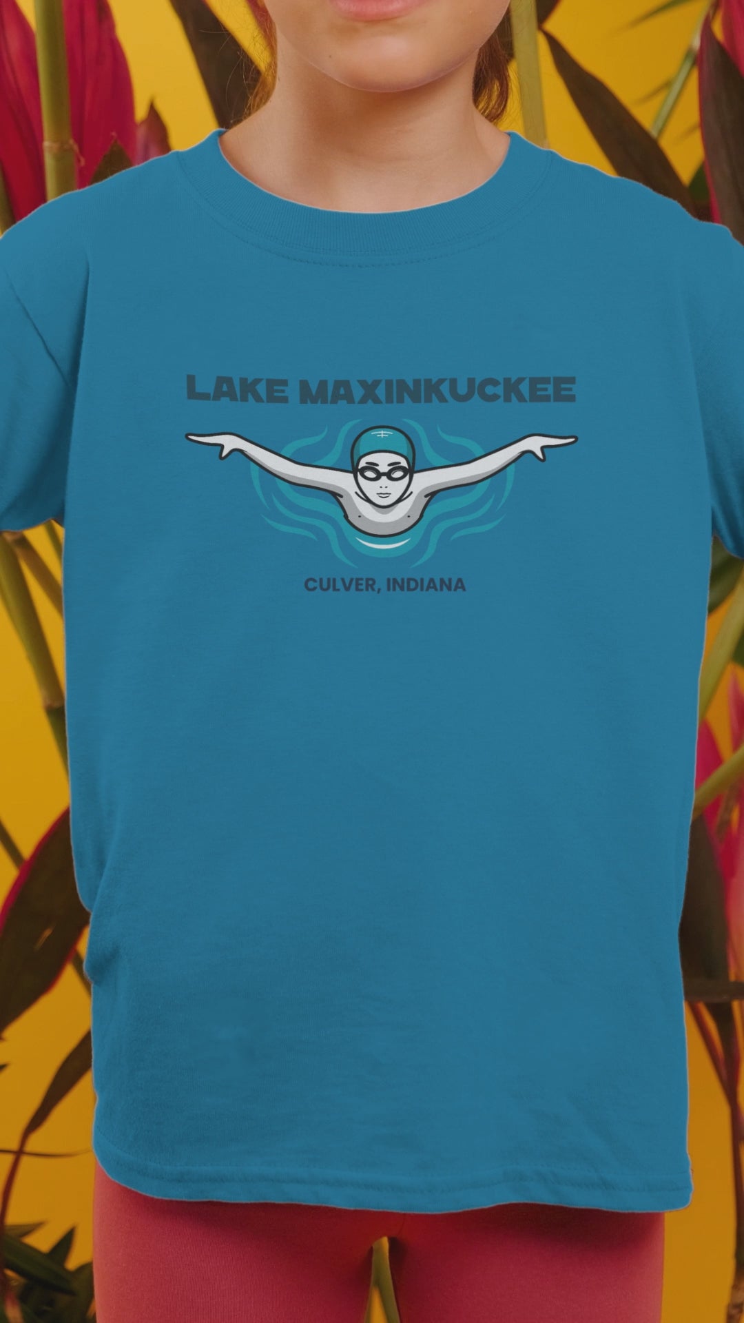 kid shirt with graphic of a shimmer from the front with arms spread and text Lake Maxinkuckee Culver Indiana